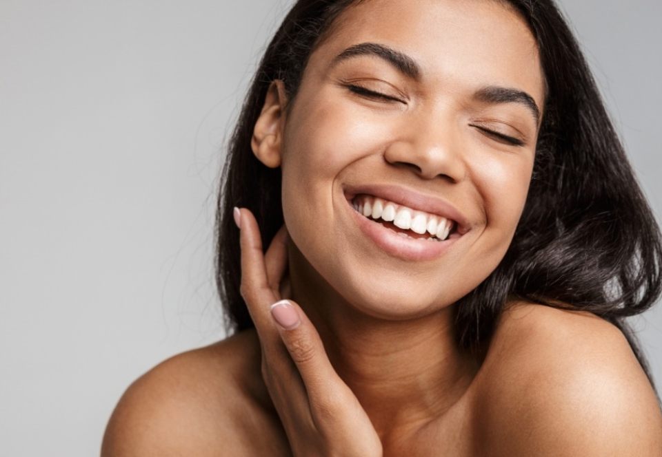picture of a girl smiling with great skin