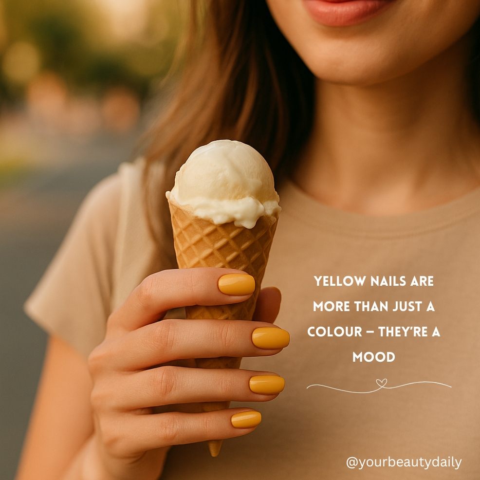 picture of a woman holding an ice cream with mustard yellow nails