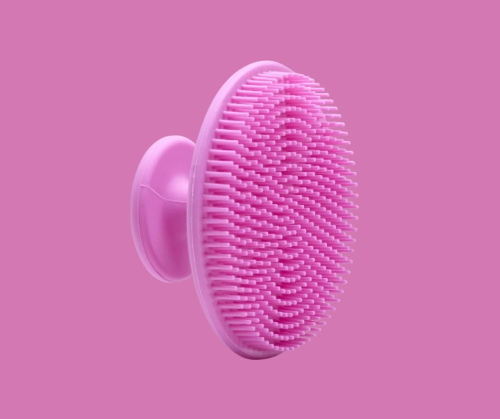 picture of a pink face scrubber tool