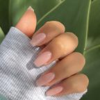 picture of a womans hand with beautiful bubble bath nail trend